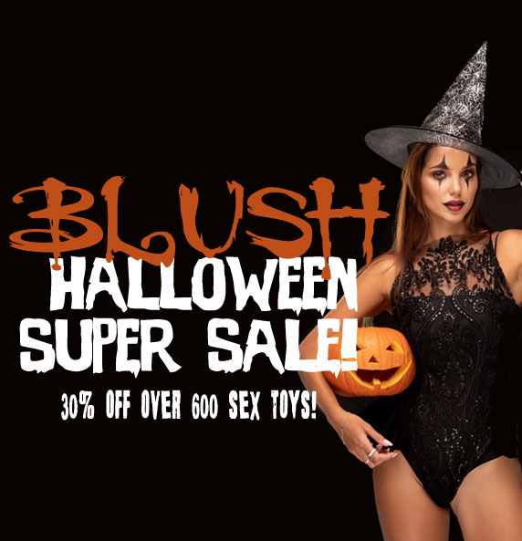 A person in a witch costume holding a pumpkin next to a Halloween sale advertisement for a discount on products.