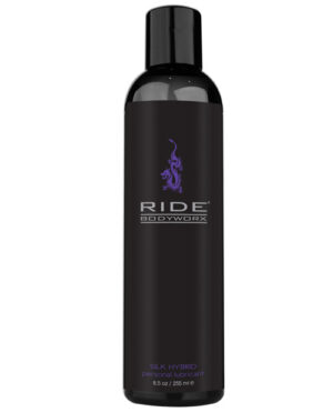 A sleek 8.5 oz bottle of RIDE Bodyworx Silk Hybrid personal lubricant featuring a modern design and branding in black and purple.