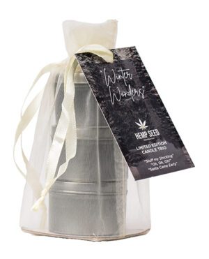 Packaged hemp seed candle set with 'Winter Wonders' tag in an organza gift bag with a satin ribbon.