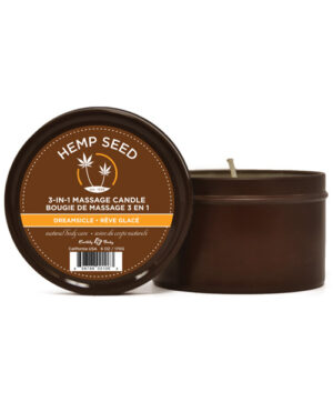 A round, dark brown massage candle with a label featuring the text "Hemp Seed, 3-in-1 Massage Candle, Dreamsicle" and indicating it is made from natural ingredients.