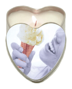 A heart-shaped candle featuring a graphic of a person joyfully holding an ice cream cone, with a lit wick at the center.