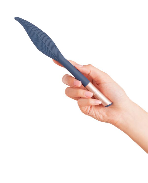 A human hand presenting a modern stylus pen against a white background.