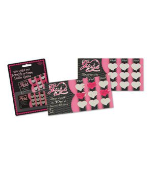 An assortment of pink and black Girls' Night Out themed scratch-off game cards with hearts and lipstick imprints.