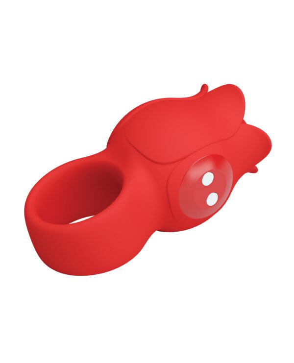 A red silicone oven mitt designed to resemble a cartoon character with round eyes and an upturned nose.