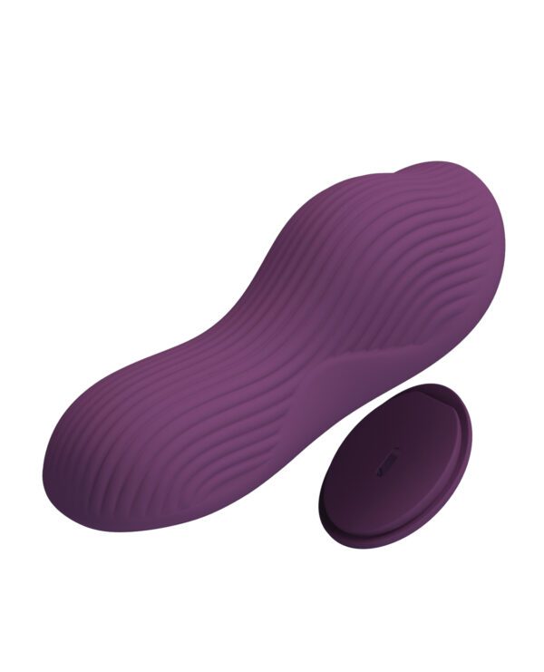 A purple ergonomic mouse pad with a contoured design and a separate round wrist rest on a white background.