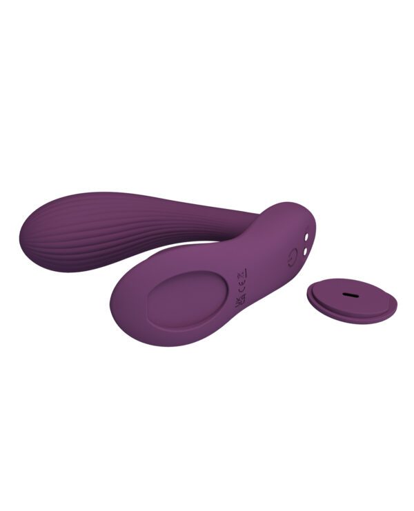 A purple wearable device with a streamlined design and button controls, isolated on a white background