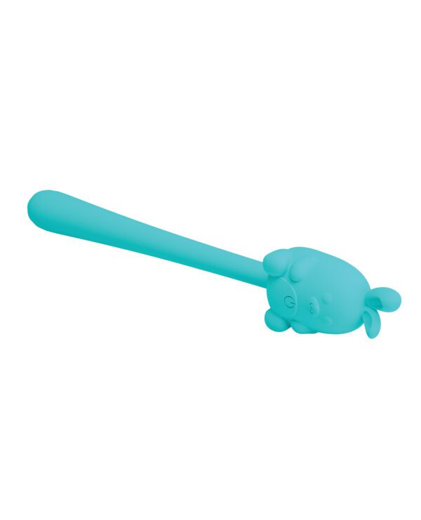 A turquoise spoon with a handle shaped like a cartoon turtle on a plain background.