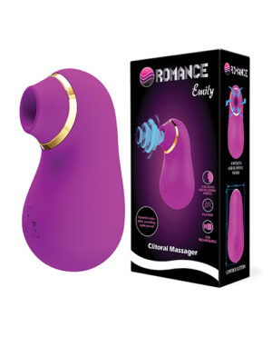 A purple clitoral massager with a sleek design and gold accents, displayed alongside its packaging featuring product details and usage instructions.