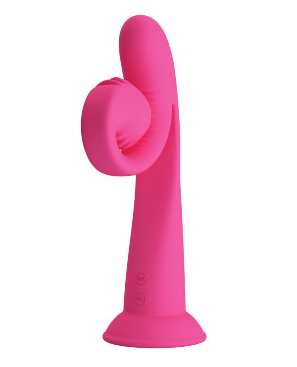 A pink silicone object with a circular element on one side and a base, displayed on a white background.