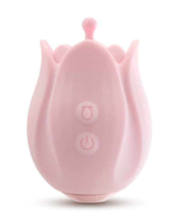 A pink, cartoon-styled animal-shaped night light with button controls isolated on a white background.