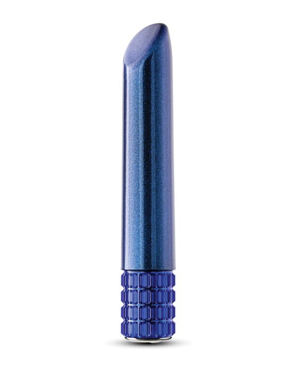 A single shimmering blue lipstick with a distinctive textured base on a white background.