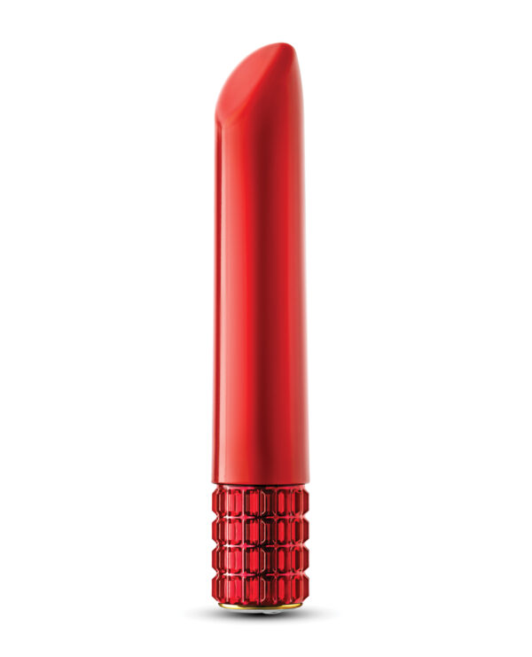 A single tube of bright red lipstick with a luxurious gem-like base on a white background.