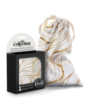 Product packaging and drawstring bag for "The Collection" by Blush, featuring beautiful designs to safely store your favorite toys. The packaging indicates the product is 100% cotton and lint-free, with a storage size of 5" x 2.5" x 12.5". The design on both the box and the bag displays elegant white and gold swirl patterns.