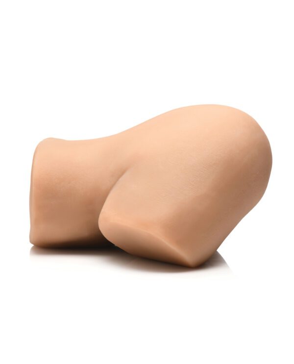 A realistic prosthetic nose model isolated on a white background