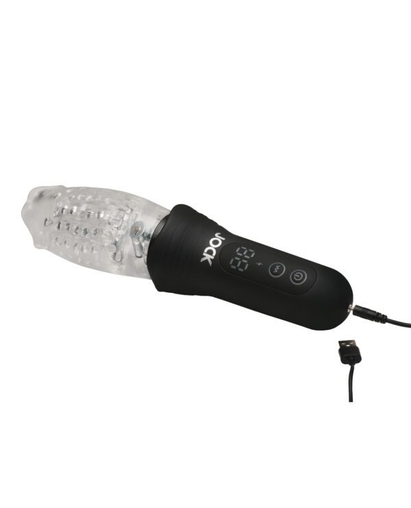 An electronic massager with a clear textured sleeve and a black control panel with buttons, shown with a detached power cord.