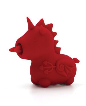 A red stylized unicorn toy figure stands against a white background with decorative elements etched into its side.