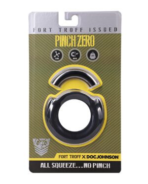 The image depicts the packaging of a PinchZero silicone cock ring by Fort Troff and Doc Johnson, featuring a black and yellow design with product information and branding.