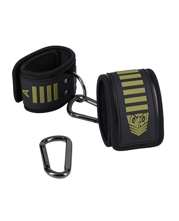 A pair of black wrist wraps with green stripes and carabiner isolated on a white background.