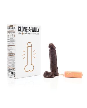 Product package for "Clone-A-Willy" next to a replica and a vibrator.