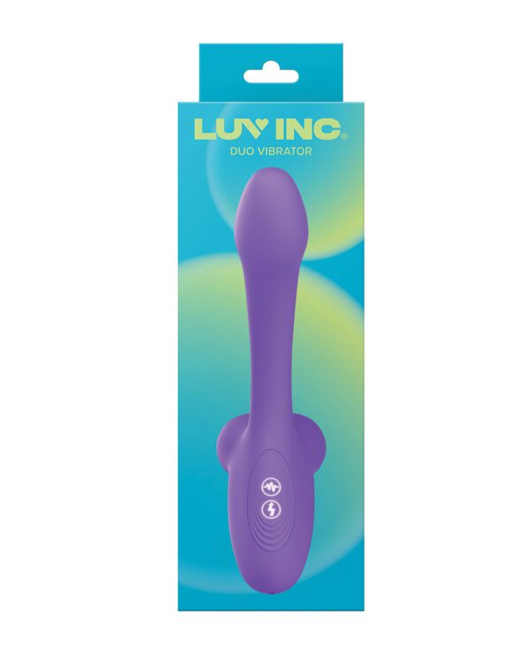 A personal massage device in purple color, packaged in a blue and green box with the brand name 'LUV INC' displayed at the top.