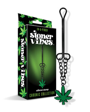 Product packaging and item for "Stoner Vibes™" from the Chronic Collection, depicting a black box with green cannabis leaf patterns and text, alongside a metallic clitoral clamp with a similar cannabis leaf design.