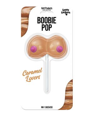 A packaged novelty lollipop designed to resemble human breasts, with the words "BOOBIE POP" and "Caramel Lovers" printed on it.