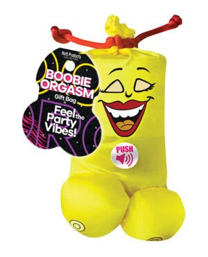 A novelty gift bag with a smiling face and suggestive design, featuring a push button and tag with text.