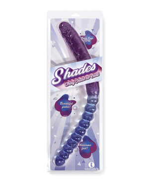 A product packaging displaying a purple, spiral-ribbed personal massage device, branded "Shades" with features such as "They fade to cool!" highlighted, encased in a clear plastic clamshell package with a white and purple background.