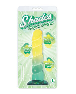 A package of "Shades" branded product displaying a gradient-colored object fading from yellow to green, with text highlighting features like "Beautiful shades!", "Body-Safe TPR", and "Awesome feel!". The background has a starburst pattern in varying shades of green.