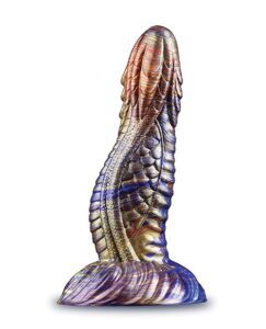 A vibrant hand-blown glass sculpture with fish-like features against a white background.