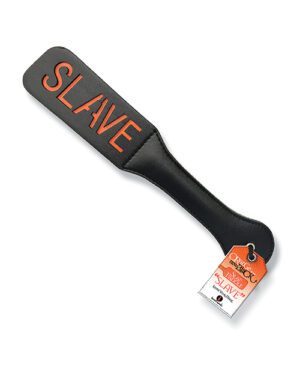 A black paddle with the word "SLAVE" written in red letters, featuring a hanging tag with text.