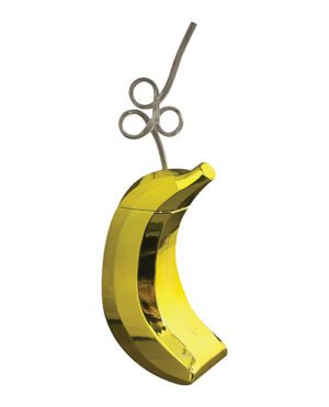 A metallic, gold-colored sculpture of a banana with a drinking straw twisted into a knot at the top.