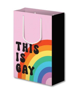 A shopping bag with a rainbow design and the phrase "THIS IS GAY" printed on it.