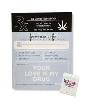 A novelty greeting card designed to resemble a medical prescription with cannabis leaf graphics, including a matchbook labeled 'kushkards'.