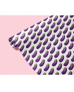 Roll of wrapping paper adorned with a repeated eggplant design on a pink background.