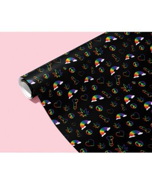 A roll of black wrapping paper with colorful patterns of hearts, rainbows, and other assorted shapes on a pink background.