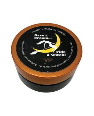 Top view of a round massage candle with label reading "Save a broom…ride a witch! PUMPKIN SPICE", featuring a silhouetted witch flying on a broom.