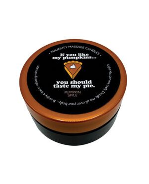 A round container with a black lid that has text and an illustration on it, indicating it is a pumpkin spice-scented massage candle.