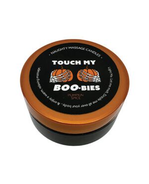 A round massage candle container with "Touch My BOO-BIES Pumpkin Spice" label.