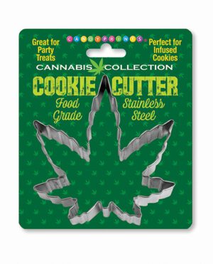 A stainless steel cannabis leaf-shaped cookie cutter on a green package with cannabis leaf pattern and text that reads "CANNABIS COLLECTION COOKIE CUTTER Food Grade."