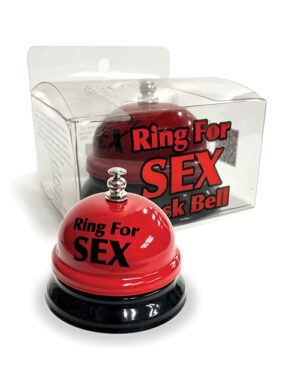 A red and black novelty desk bell with the text "Ring For Sex" displayed on the bell and its packaging.