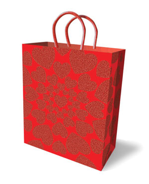 A vibrant red gift bag adorned with glittering heart patterns, perfect for special occasions.