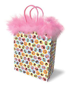 A colorful gift bag adorned with various lip prints and a fluffy pink feather trim at the top.