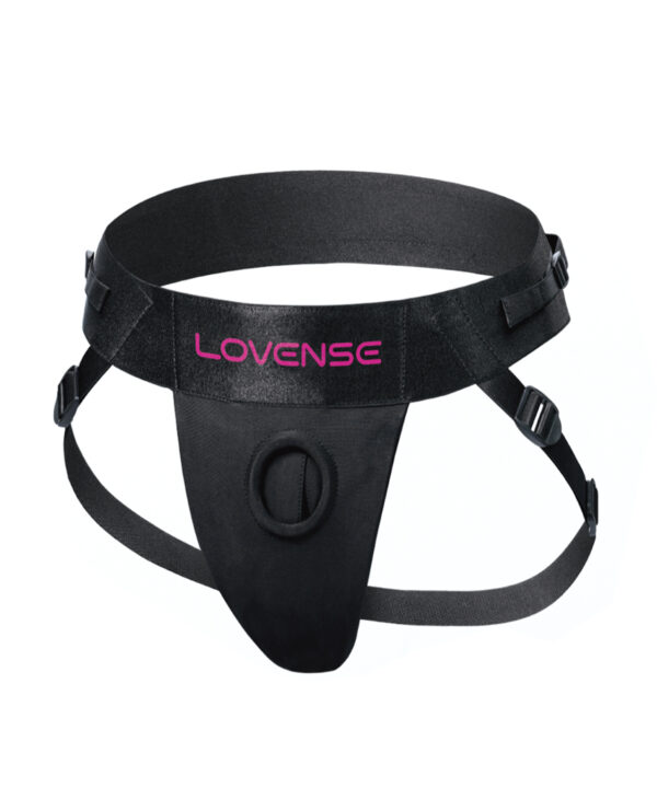 Black adjustable harness designed to hold pleasure devices, featuring Lovense branding and secure fastenings.