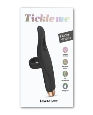 Product packaging of "Tickleme Finger Vibrator" displaying a black silicone finger-worn device with gold accents, highlighting features such as powerful vibration, USB rechargeable, and waterproof, branded by "Love to Love".