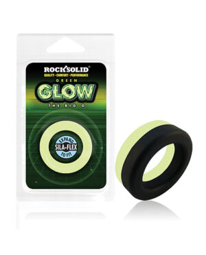 A silicone ring with black and glow-in-the-dark green colors, displayed in its packaging, emphasizing comfort and performance.