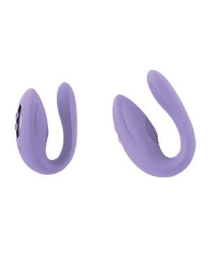 Two purple wearable smart devices displayed against a white background, one showing buttons and the other from a side angle.