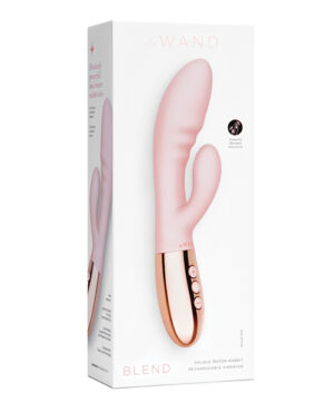 Packaging for le Wand Blend, a rechargeable double motor rabbit vibrator in soft pink with a stylish rose gold base.