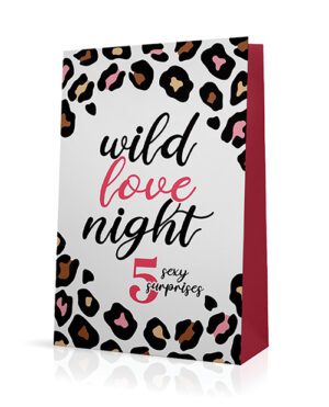 A gift bag with a leopard print design and the text "wild love night" along with "5 sexy surprises" written on the front.