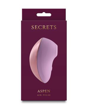 Product packaging for "SECRETS ASPEN AIR PULSE" in maroon and purple hues with an image of the product, which has a curved and ergonomic design.
